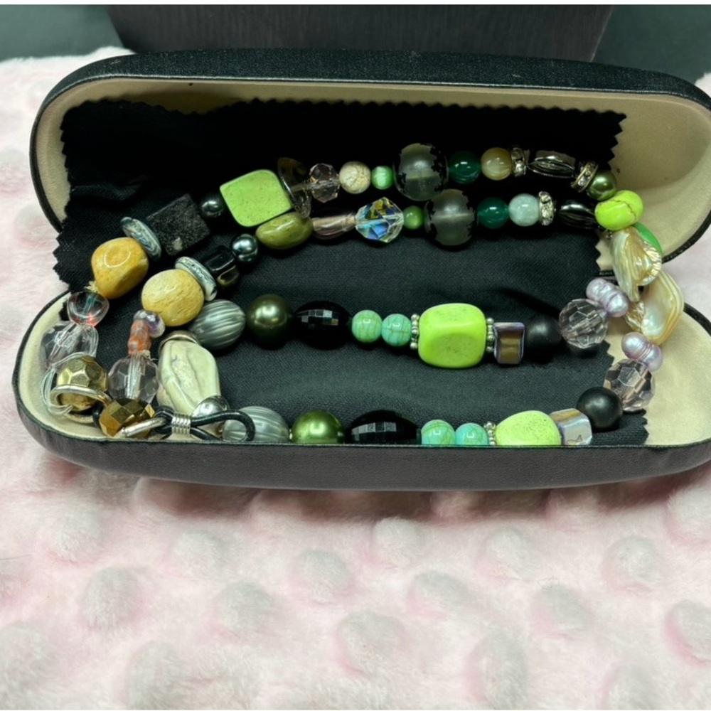 Handcrafted by Evi Vaucher de la Croix..genuine stones hold your glasses…